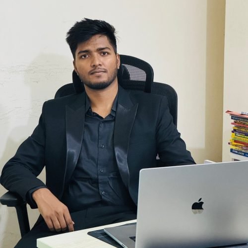 Saidur Rahaman Jahir, founder of WeddWonders wedding video editing studio, at his desk